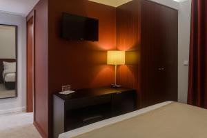 Cama ou camas em um quarto em Hotel Torre Mar