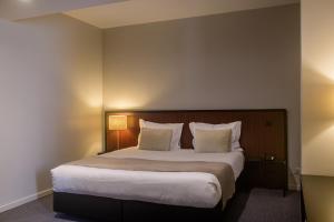 Cama ou camas em um quarto em Hotel Torre Mar