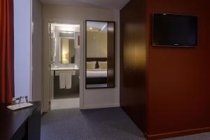 Cama ou camas em um quarto em Hotel Torre Mar