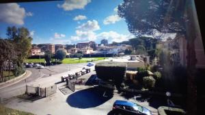 a view from a window of a parking lot at ALBEA in Rome