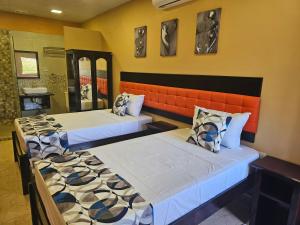 Postel nebo postele na pokoji v ubytování Beres Vale Apartments