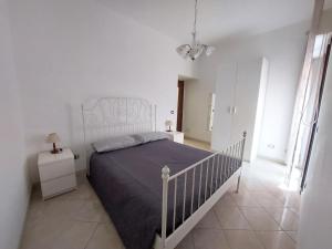 Postel nebo postele na pokoji v ubytování Fronte porto apartment 2