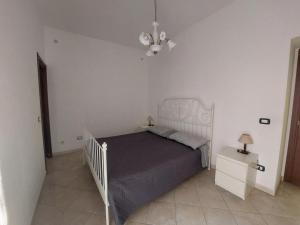 Postel nebo postele na pokoji v ubytování Fronte porto apartment 2