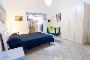 Postel nebo postele na pokoji v ubytování DOMU DE TUNI Sa Buttega + 7 fotografií