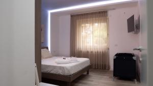 Postel nebo postele na pokoji v ubytování Wanderlust Guesthouse