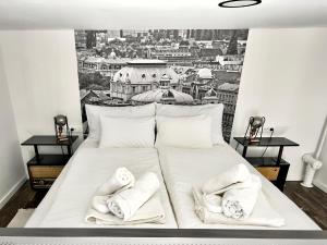 Postel nebo postele na pokoji v ubytování Zagreb Industrial Charm 1 & 2