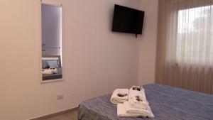Postel nebo postele na pokoji v ubytování Wanderlust Guesthouse