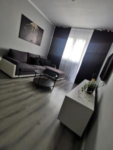 Χώρος καθιστικού στο Apartament Londyńska 11