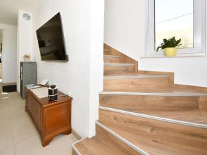 Μια τηλεόραση ή/και κέντρο ψυχαγωγίας στο Holiday Home Sea side by Interhome