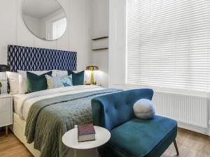 Katil atau katil-katil dalam bilik di Studio Kensington Apartments-3 by Interhome