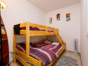 a bedroom with two bunk beds in a room at Apartment Andreas by Interhome in Balatonőszöd
