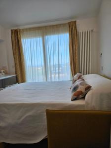 Postel nebo postele na pokoji v ubytování MiniMaison