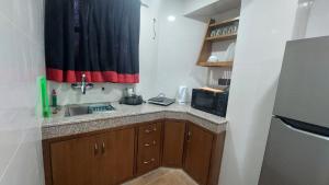 Kjøkken eller kjøkkenkrok på Bishram Homes