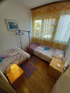 Postel nebo postele na pokoji v ubytování Apartment Mystic