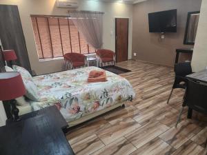 Μια τηλεόραση ή/και κέντρο ψυχαγωγίας στο South Gate Lodge +26 φωτογραφίες