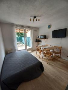 Et tv og/eller underholdning på Appartement, Terrasse, Soleil, Luz