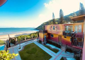 a house with a view of the beach at Pousada São Miguel Beach Beira Mar in Penha