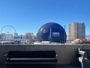 a view of a largeysical object with a city in the background at In the heart of Vegas luxury 2B2B sleeps 6 in Las Vegas