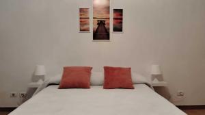 Łóżko lub łóżka w pokoju w obiekcie Amplio apartamento recién reformado