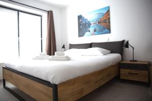 Katil atau katil-katil dalam bilik di Beautiful Design 2 BR Loft