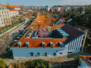an overhead view of a building with an orange roof at Bazilika alatt Panzió in Esztergom