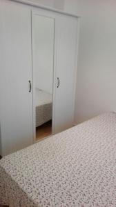 Кровать или кровати в номере Apartamento 3 Dormitorios en Sanchez Preciados