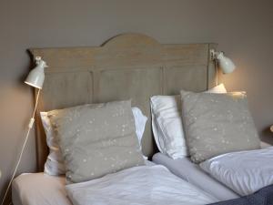 En eller flere senge i et værelse på Bed & Bike Ô lit de l'Ourthe