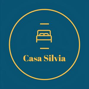 a blue circle with the text csa siliya at Casa Silvia in Marsala