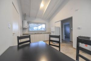 Η κουζίνα ή μικρή κουζίνα στο Wingfield Cabañas Resort
