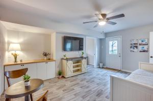 a living room with a bed and a table at Willis Vacation Rental about 2 Mi to Lake Conroe! in Willis