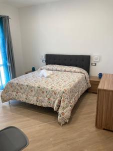 Ένα ή περισσότερα κρεβάτια σε δωμάτιο στο Luxury Maison Avola e Mare