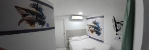 Koupelna v ubytování Hotel Dmauro