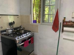 Η κουζίνα ή μικρή κουζίνα στο Monasterio del Mono
