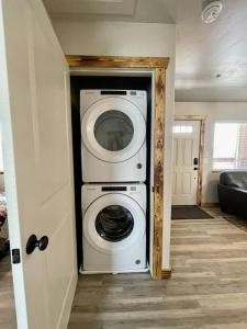 a laundry room with a washer and dryer in a house at Angel Rock Rentals of Moab Unit 10 in Moab