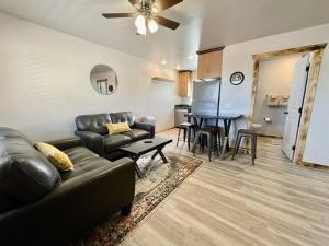 a living room with a couch and a table at Angel Rock Rentals of Moab Unit 10 in Moab