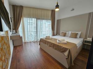 Krevet ili kreveti u jedinici u okviru objekta Lolo Luxury rooms & suites