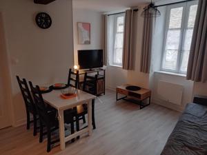 TV a/nebo společenská místnost v ubytování Appartement Eden