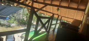 a view from the inside of a house with a window at LE CHALET in Barranquilla