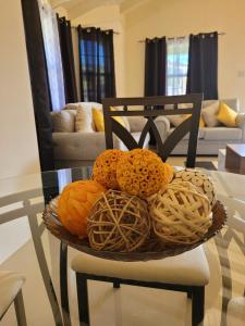 a basket of balls on top of a table at Island Hideaway in Falmouth