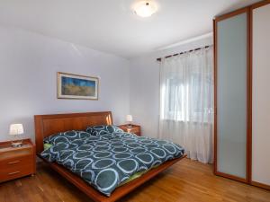 Posteľ alebo postele v izbe v ubytovaní Apartments with a parking space Kostrena, Rijeka - 14285