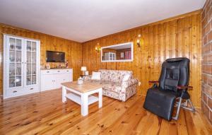 a living room with a couch and a table at Family friendly house with a parking space Dragovanscak, Prigorje - 22529 in Jastrebarsko