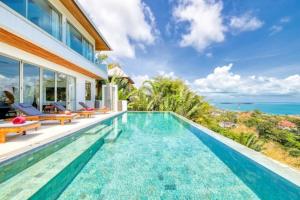 La pileta dentro o cerca de Villa Jaliza - Sea View 6BR Samui