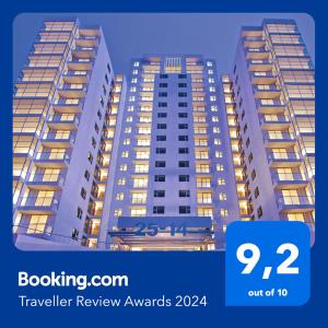 two tall apartment buildings with the words travel review awards at 2 Rooms, 1 King Size bed, 64" Smart HDTV in Guatemala