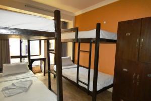 Postel nebo postele na pokoji v ubytování Paradise Guest House
