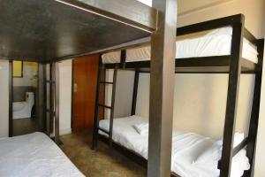 Postel nebo postele na pokoji v ubytování Paradise Guest House