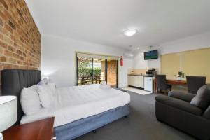 Kuchyň nebo kuchyňský kout v ubytování Potters Apartments + 37 fotografií