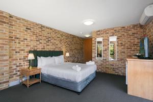 Potters Apartments客房内的一张或多张床位