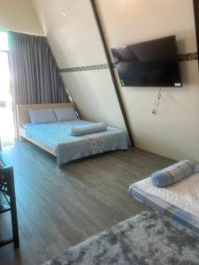 Postel nebo postele na pokoji v ubytování Homestay Á Âu Family