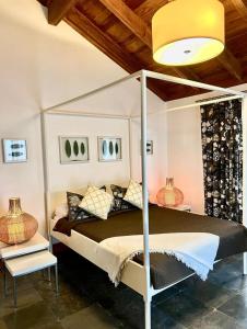 Кровать или кровати в номере VIP Terrenas Service