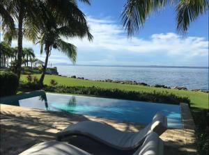 The swimming pool at or close to VIP Terrenas Service